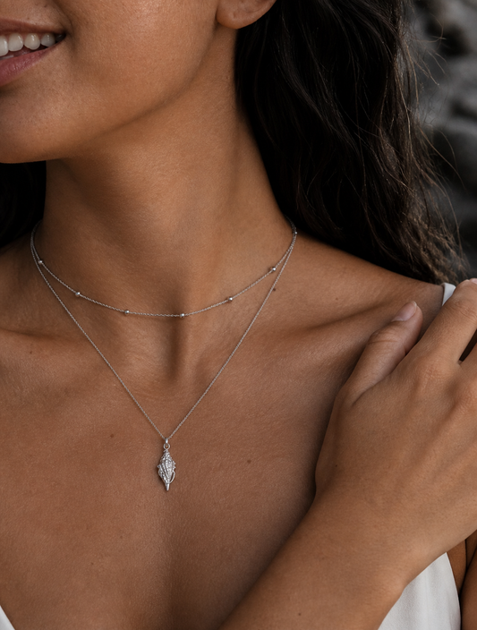 The Ocean Echo Layered Conch Necklace